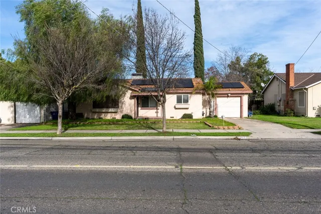 a view of street with houses on both side