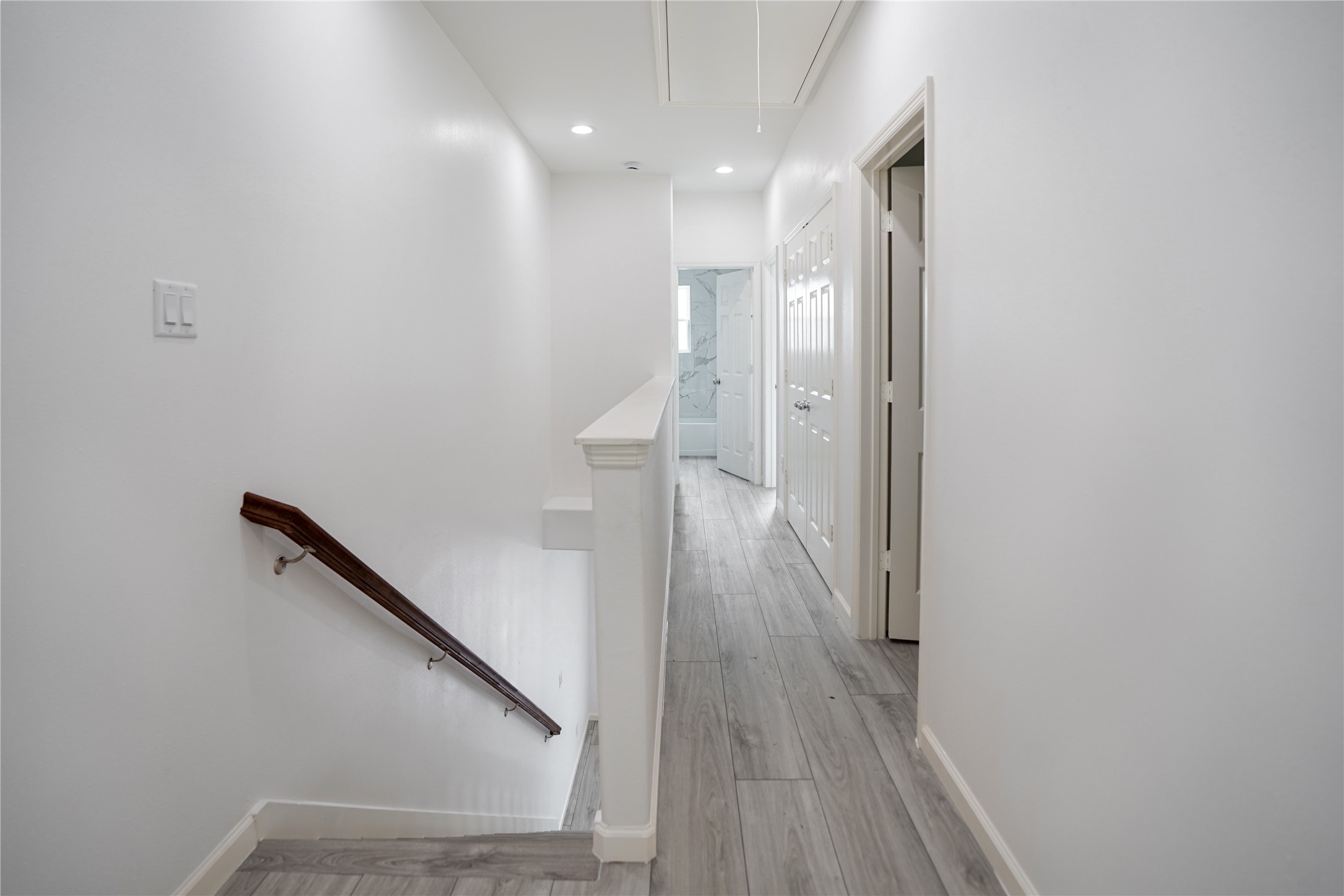 7914 Laura Koppe Road, Unit A Houston, TX 77028 - Photo 7 of 14 a view of a hallway with wooden floor