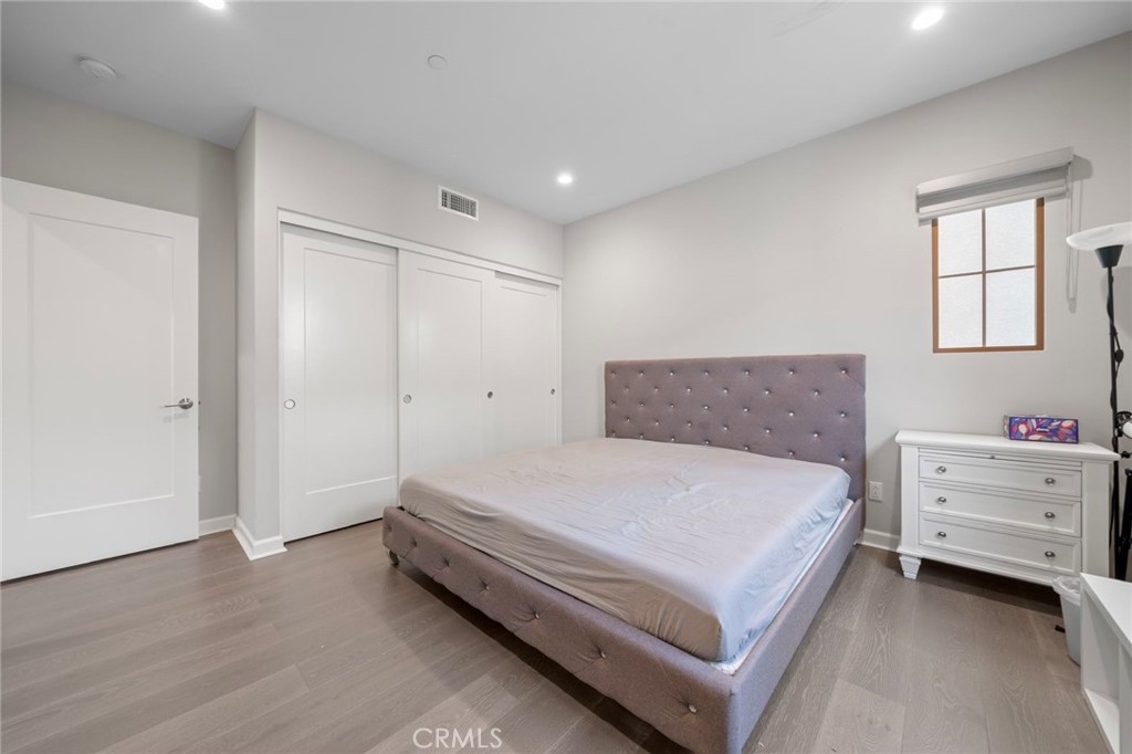 109 Soaring Eagle Irvine, CA 92618 - Photo 24 of 41 a bathroom with a bed and a window