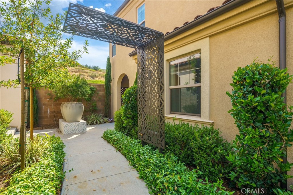 109 Soaring Eagle Irvine, CA 92618 - Photo 40 of 41 a view of a patio with table and chairs and potted plants
