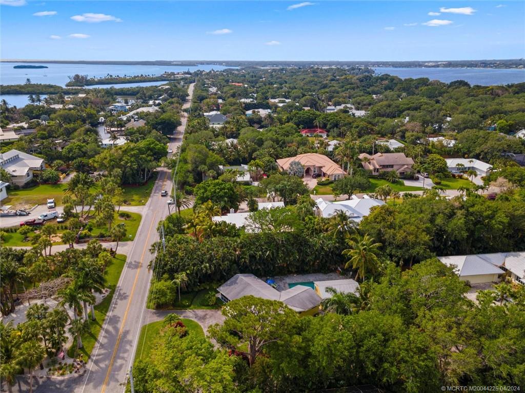 111 South Sewalls Point Road Stuart, FL 34996 - Photo 53 of 60 an aerial view of residential houses with outdoor space and trees