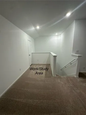 an view of a room with window