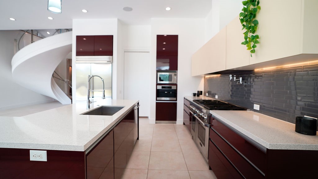 3308 North MacGregor Way Houston, TX 77004 - Photo 20 of 46 Large gas stove with a pot filler and built in coffee maker