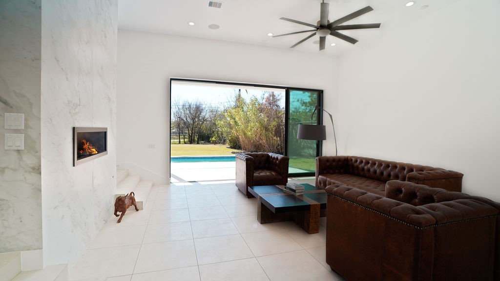 3308 North MacGregor Way Houston, TX 77004 - Photo 22 of 46 Family room has large glass sliding doors for a true indoor/outdoor living experience