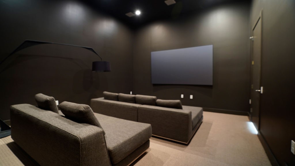 3308 North MacGregor Way Houston, TX 77004 - Photo 24 of 46 The media room is just off the family room and has a projector and surround sound system