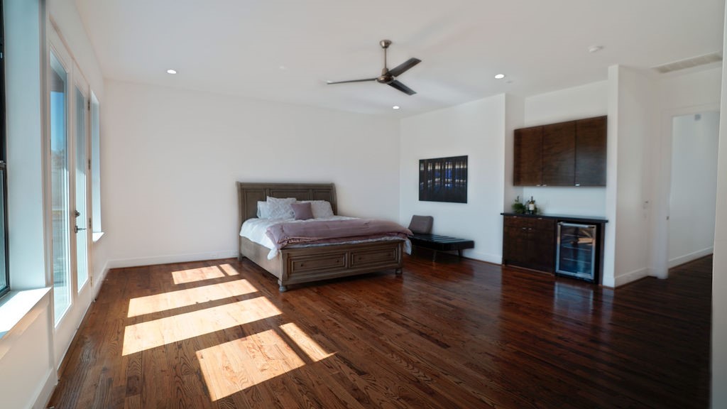 3308 North MacGregor Way Houston, TX 77004 - Photo 32 of 46 The Primary Bedroom also offers a bar with wine fridge