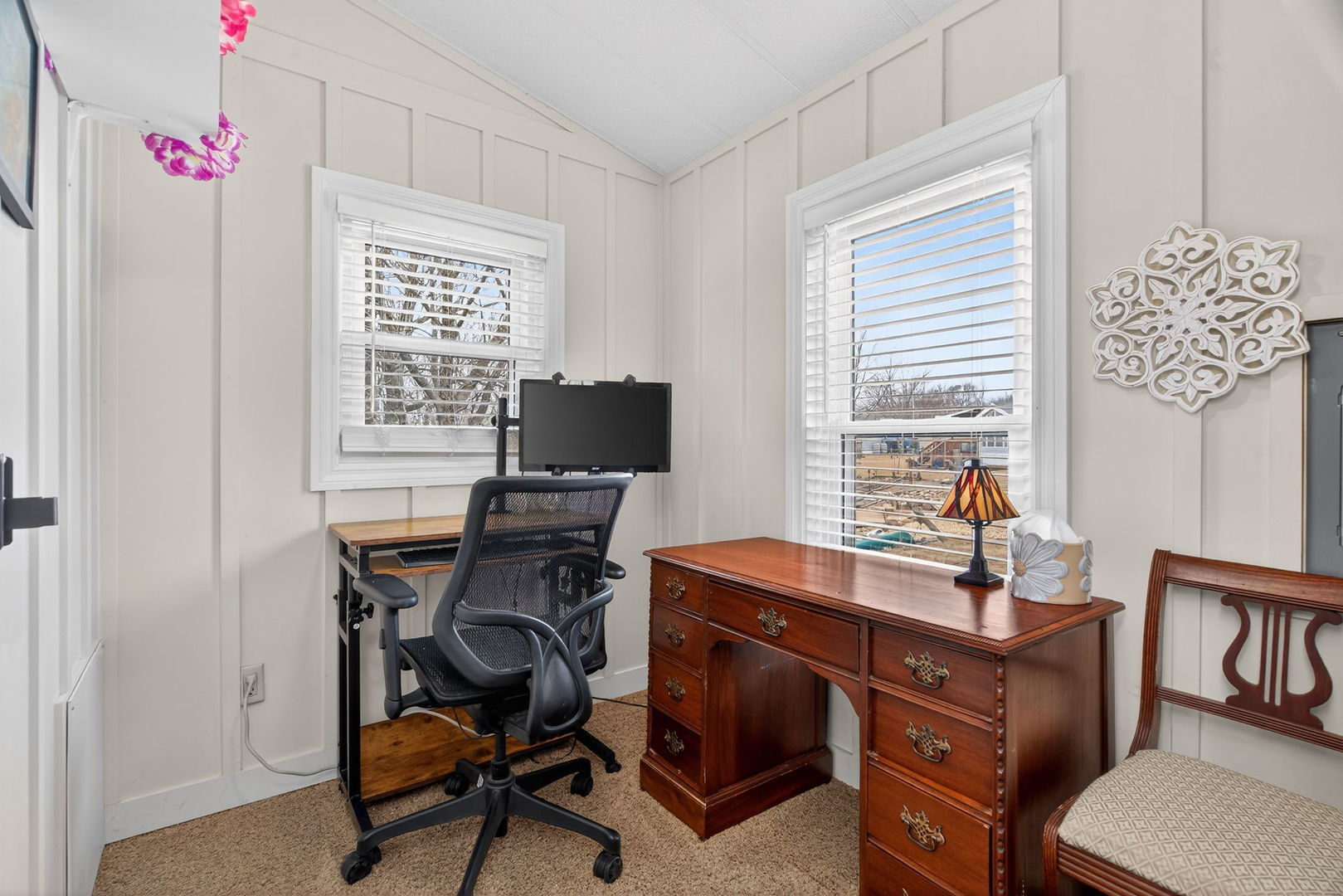 95 Dinosaur Road Wilmington, IL 60481 - Photo 13 of 54 a view of a workspace with furniture and a window