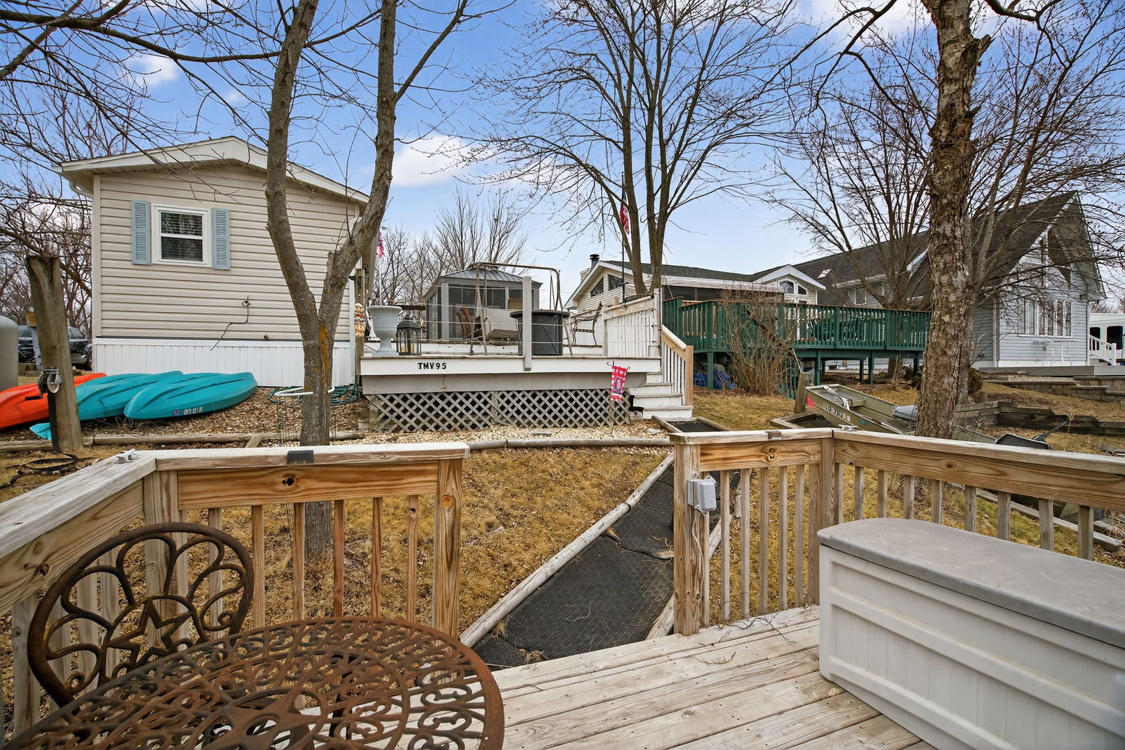 95 Dinosaur Road Wilmington, IL 60481 - Photo 27 of 54 a view of a house with pool and chairs