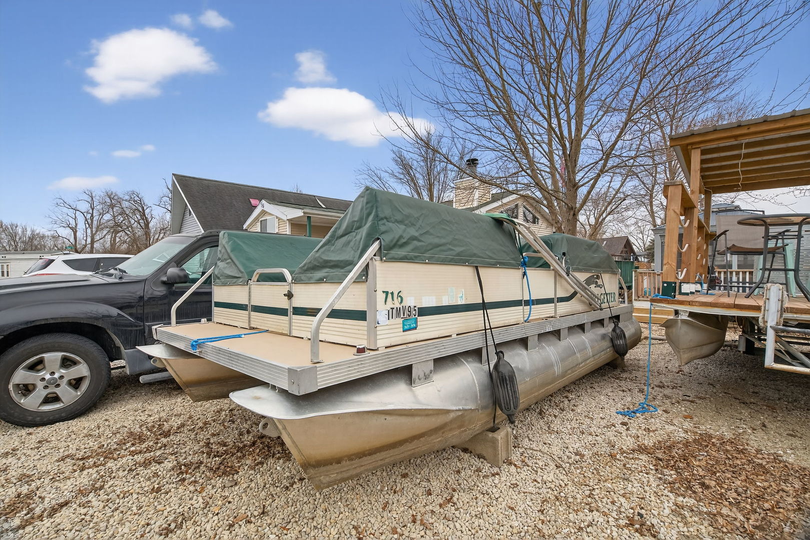 95 Dinosaur Road Wilmington, IL 60481 - Photo 32 of 54 a view of a backyard with a table and chairs
