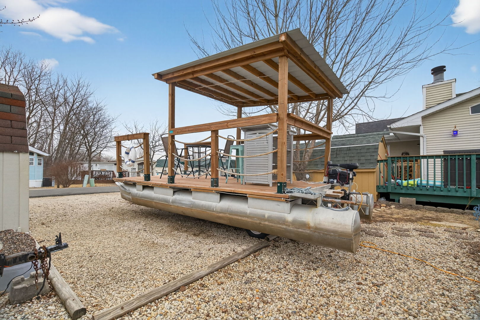 95 Dinosaur Road Wilmington, IL 60481 - Photo 33 of 54 a view of a house with backyard and sitting area