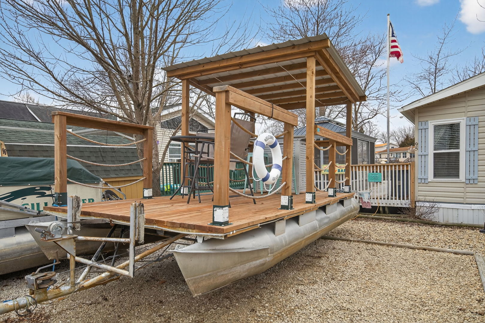95 Dinosaur Road Wilmington, IL 60481 - Photo 34 of 54 a view of a patio with a table and chairs