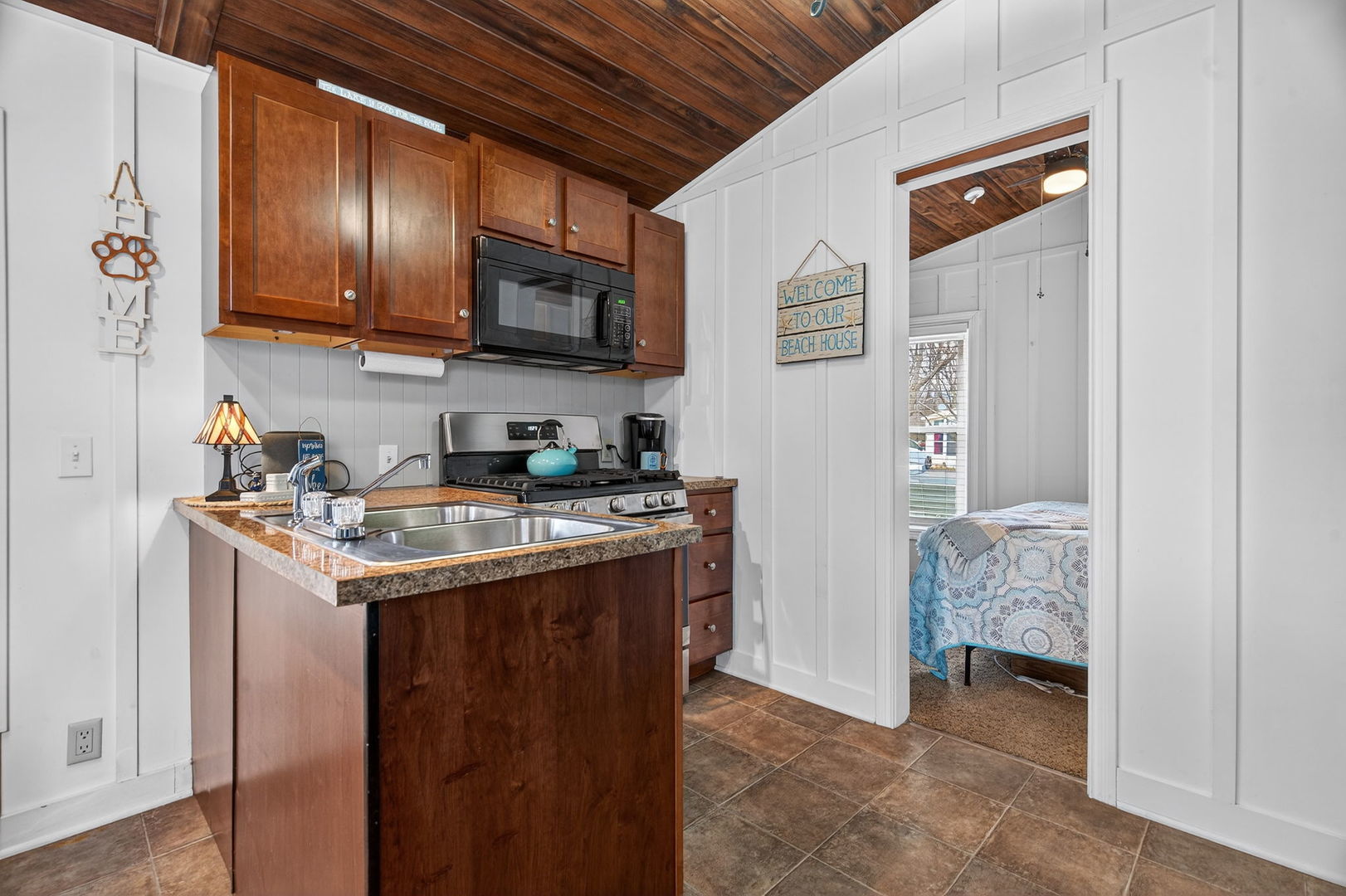 95 Dinosaur Road Wilmington, IL 60481 - Photo 9 of 54 a kitchen with stainless steel appliances granite countertop a stove and a refrigerator