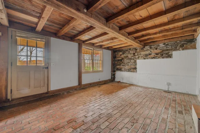 a kitchen with a stove and a sink