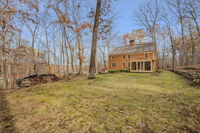 a view of a swimming pool and an outdoor space