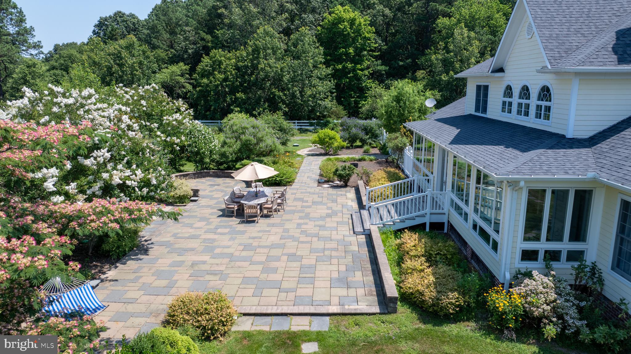 26604 East Bonfield Road Oxford, MD 21654 - Photo 33 of 44 an aerial view of a house with swimming pool garden and patio