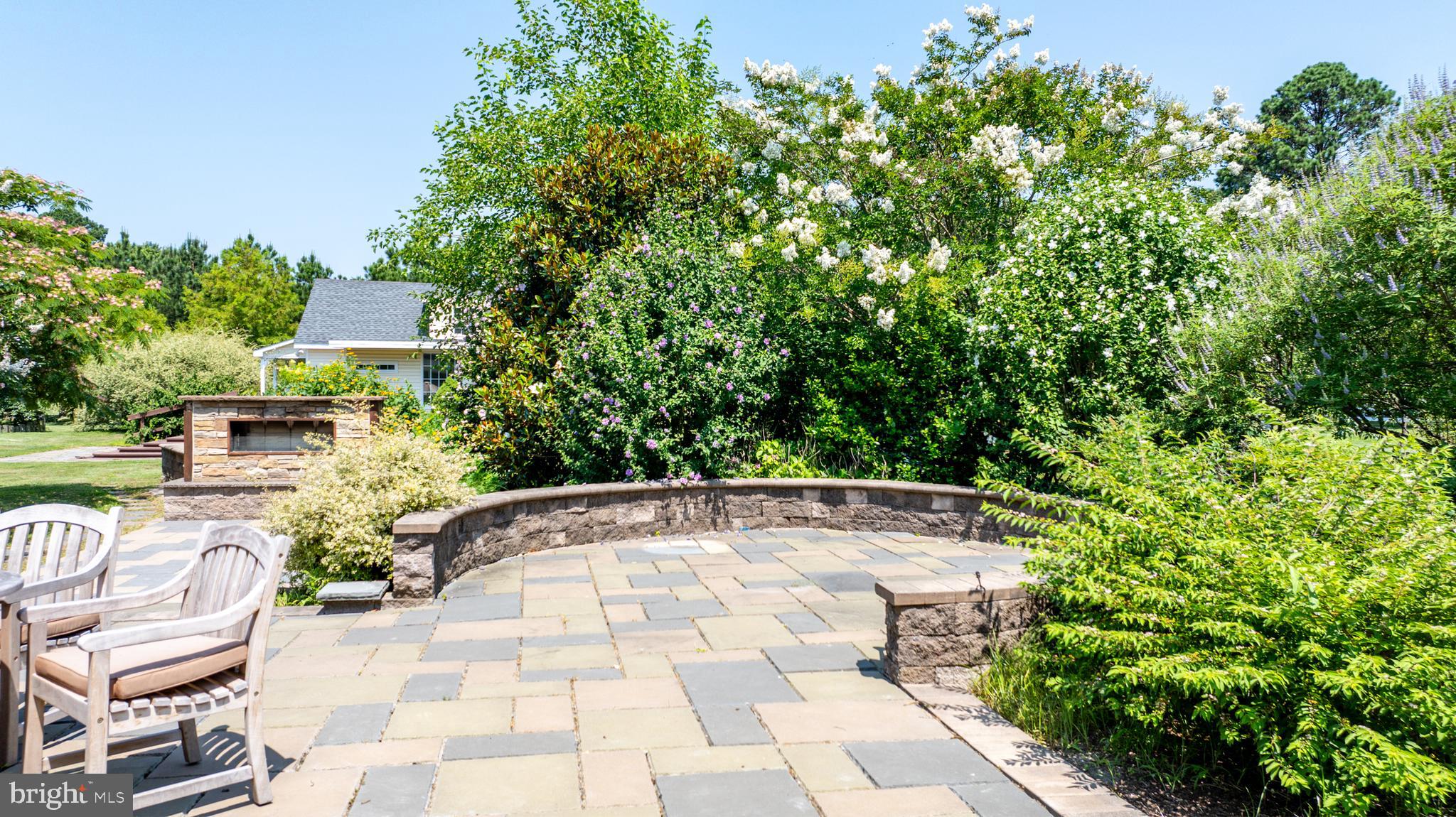26604 East Bonfield Road Oxford, MD 21654 - Photo 34 of 44 an outdoor space with patio