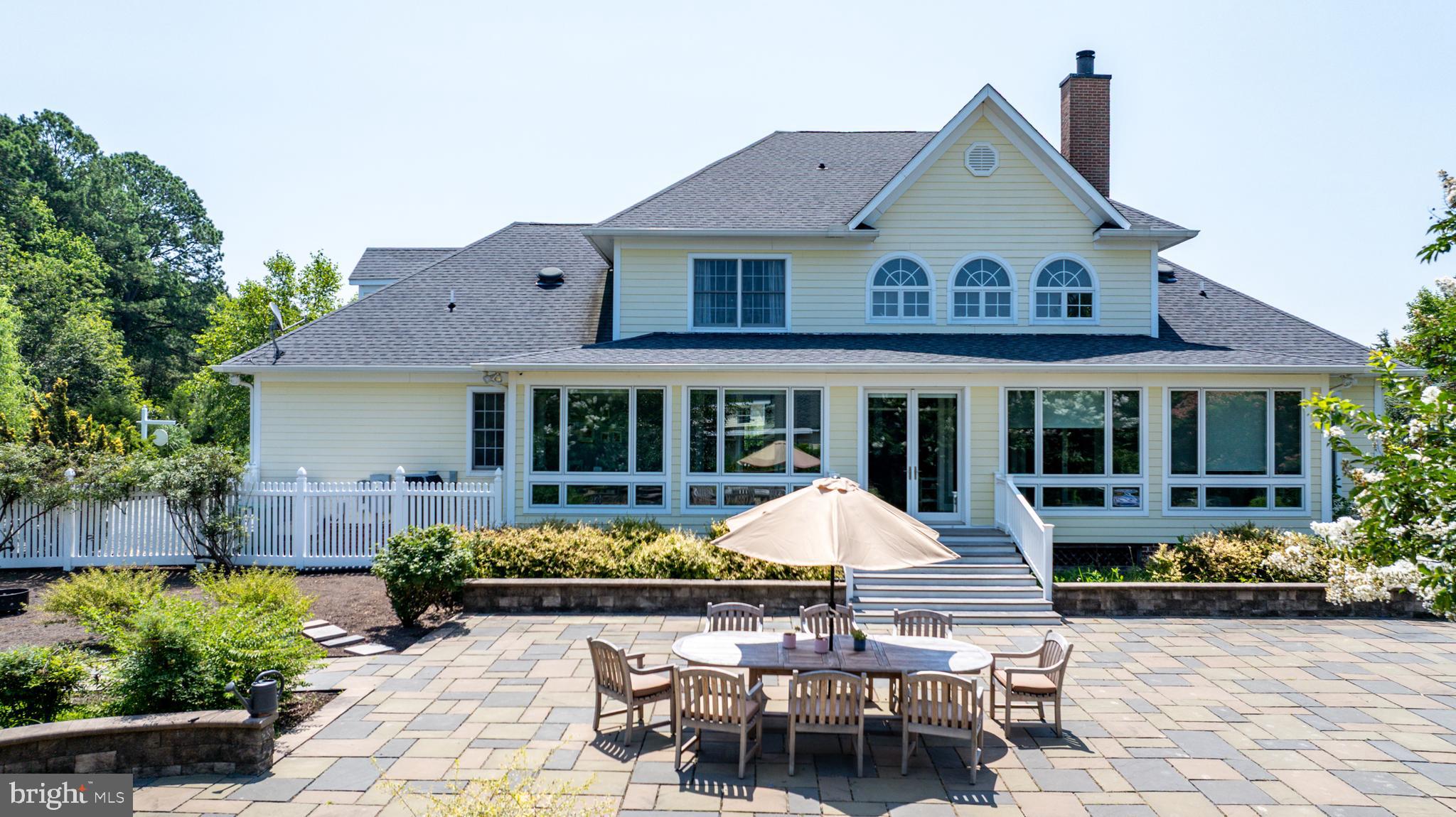 26604 East Bonfield Road Oxford, MD 21654 - Photo 37 of 44 a view of a house with a sitting area