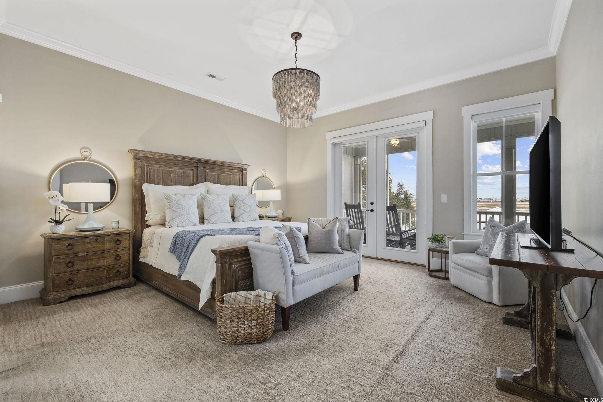 636 North Creekside Drive Murrells Inlet, SC 29576 - Photo 11 of 40 Bedroom with access to exterior, french doors, carpet flooring, ornamental molding, and a chandelier