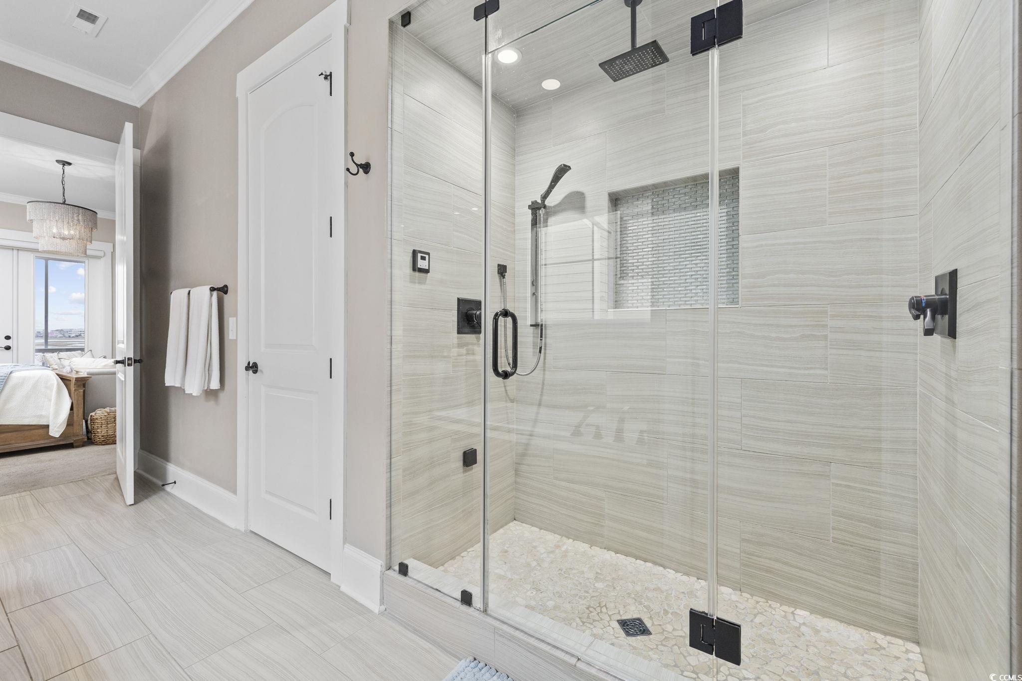 636 North Creekside Drive Murrells Inlet, SC 29576 - Photo 13 of 40 Full bath with ensuite bath, a shower stall, and ornamental molding