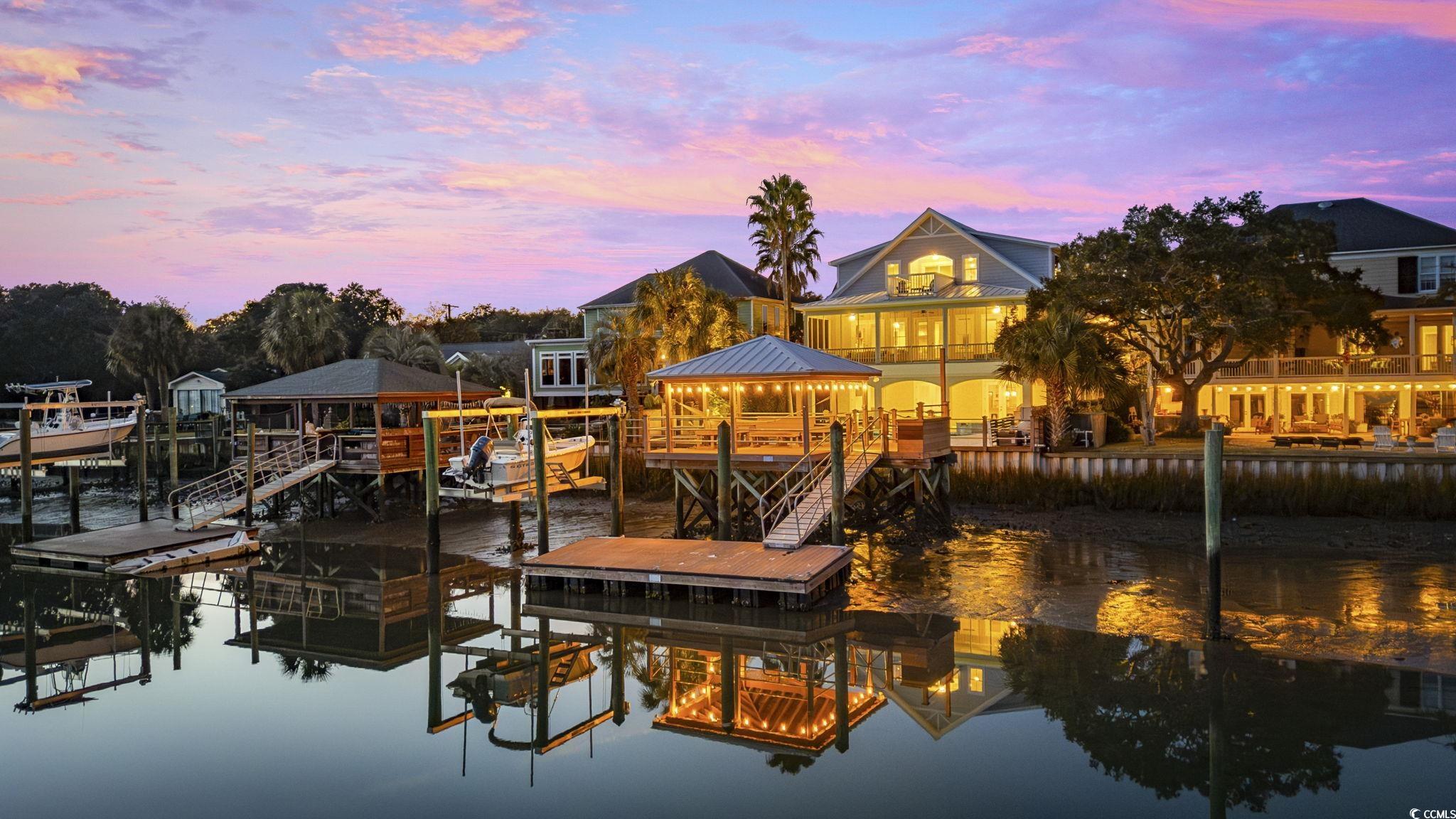636 North Creekside Drive Murrells Inlet, SC 29576 - Photo 2 of 40 Dock featuring a water view, a gazebo, and boat lift