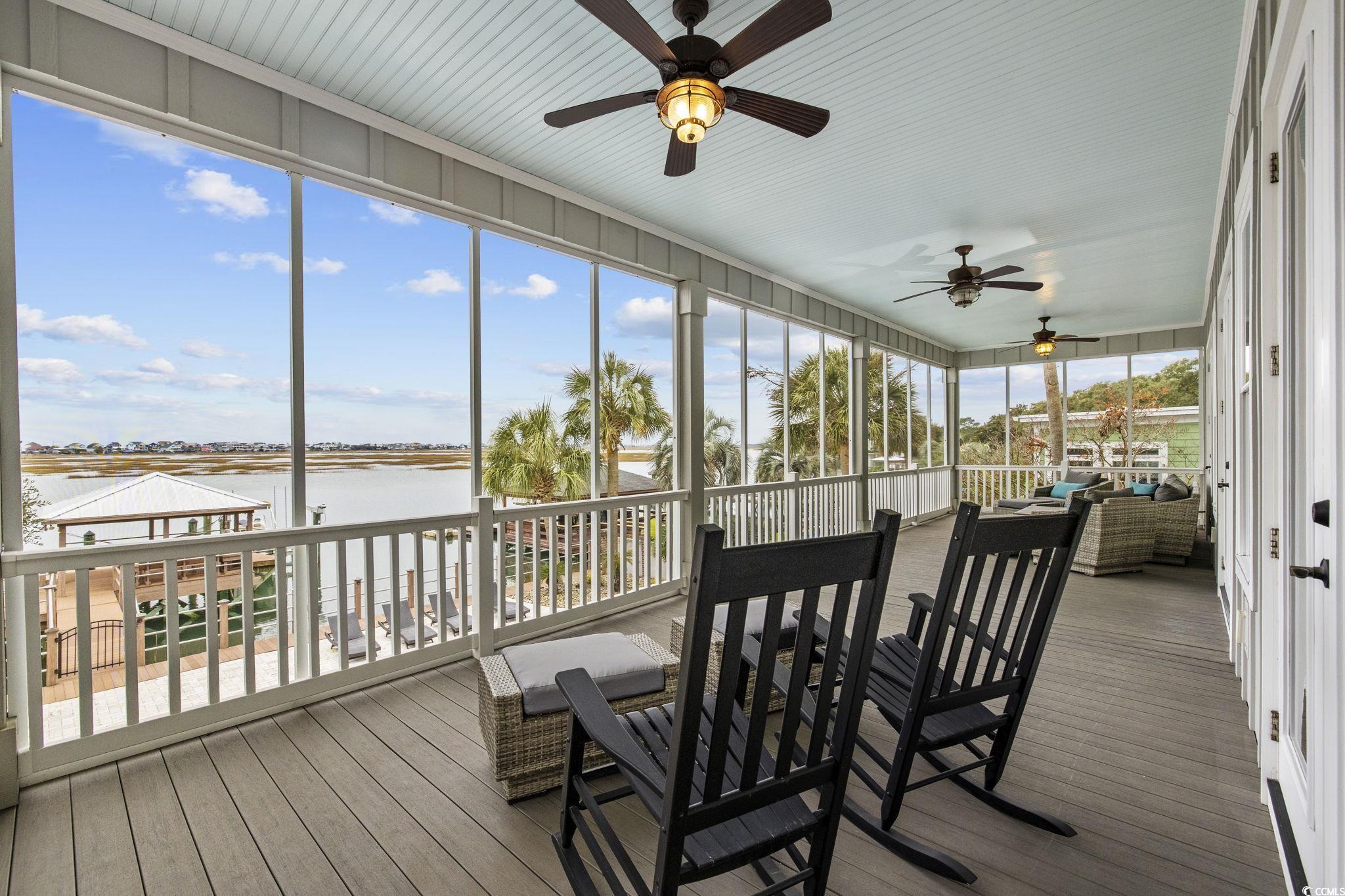 636 North Creekside Drive Murrells Inlet, SC 29576 - Photo 21 of 40 Sunroom with a ceiling fan and a water view