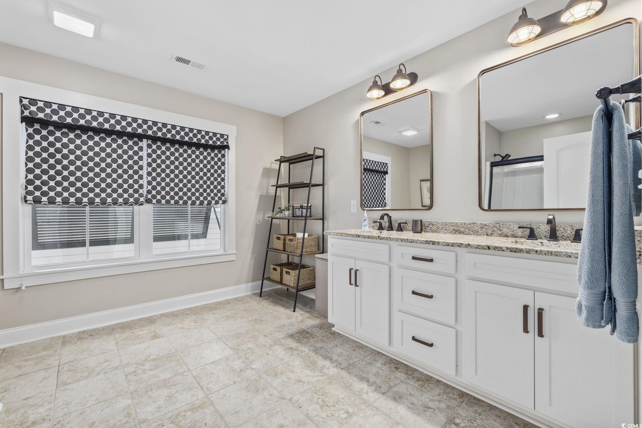 636 North Creekside Drive Murrells Inlet, SC 29576 - Photo 23 of 40 Bathroom with double vanity and a shower