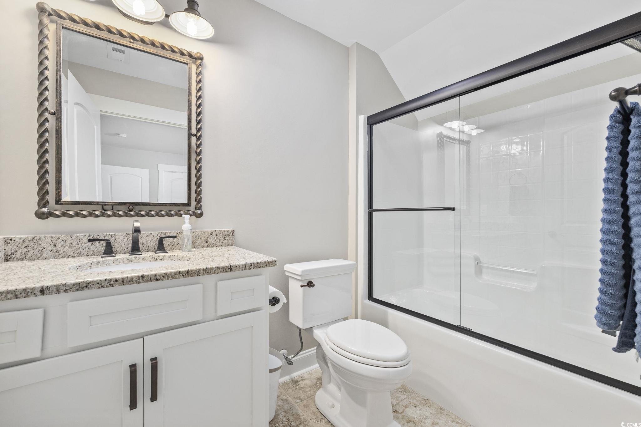 636 North Creekside Drive Murrells Inlet, SC 29576 - Photo 25 of 40 Full bathroom with vanity and shower / bath combination with glass door