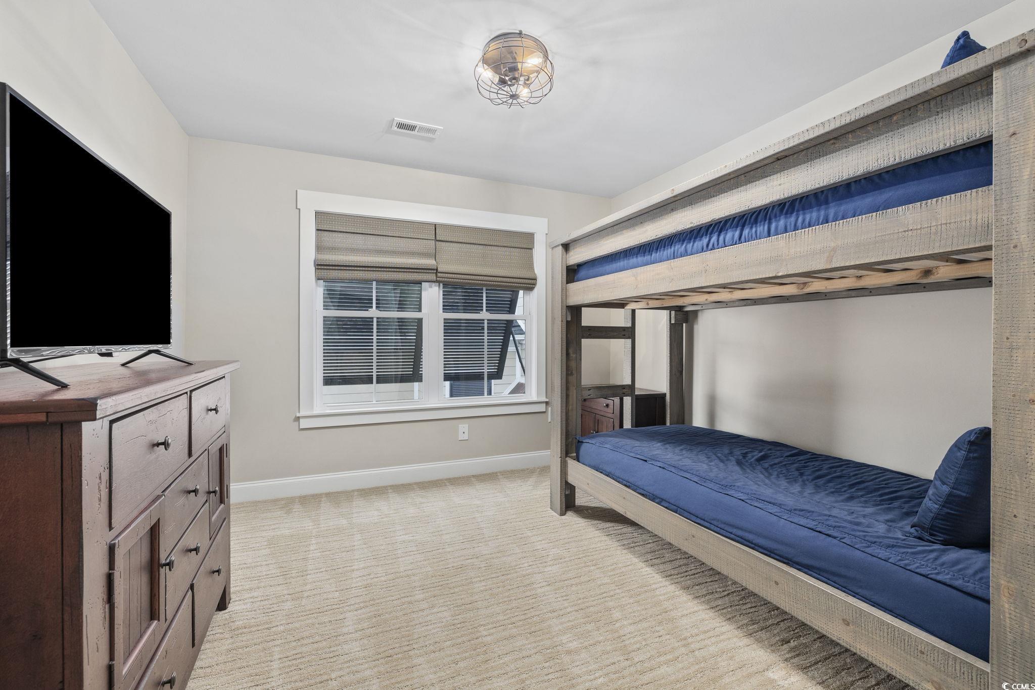636 North Creekside Drive Murrells Inlet, SC 29576 - Photo 26 of 40 Bedroom with baseboards and light colored carpet