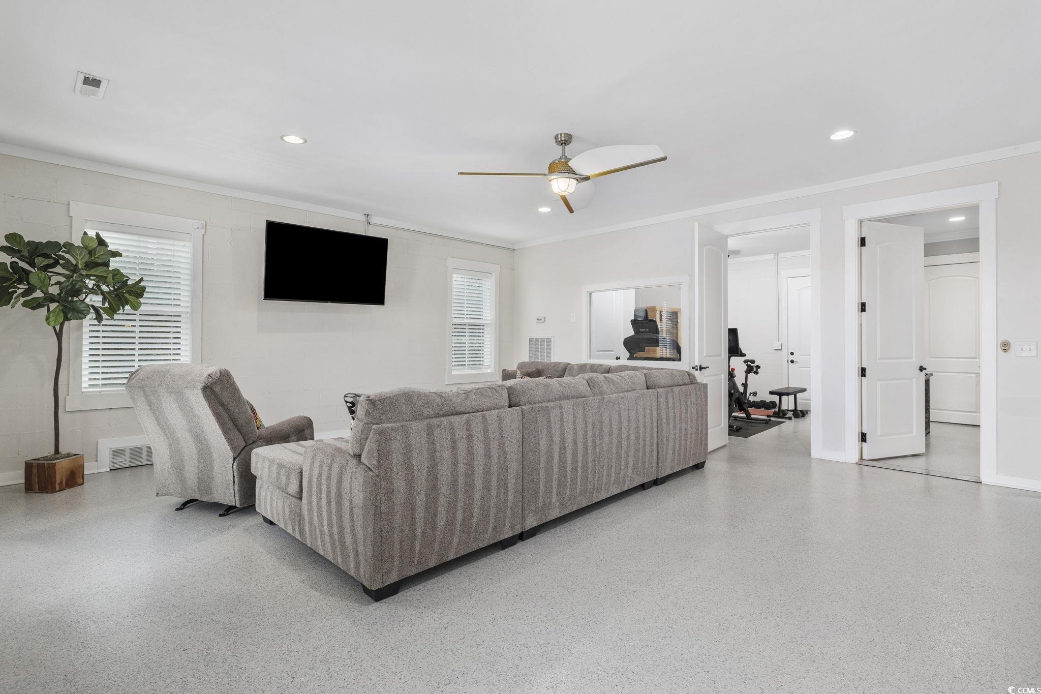 636 North Creekside Drive Murrells Inlet, SC 29576 - Photo 30 of 40 Living area with ceiling fan, recessed lighting, and ornamental molding