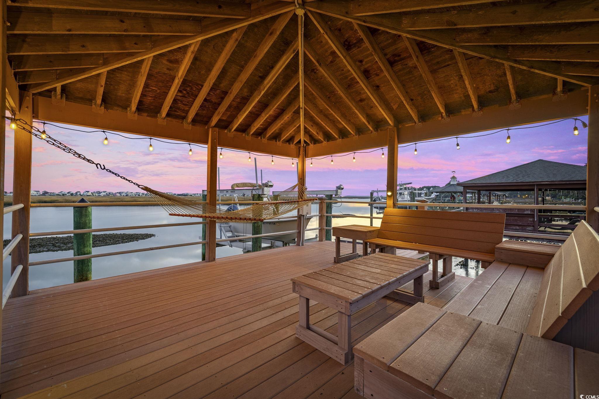 636 North Creekside Drive Murrells Inlet, SC 29576 - Photo 38 of 40 Dock with a water view and boat lift