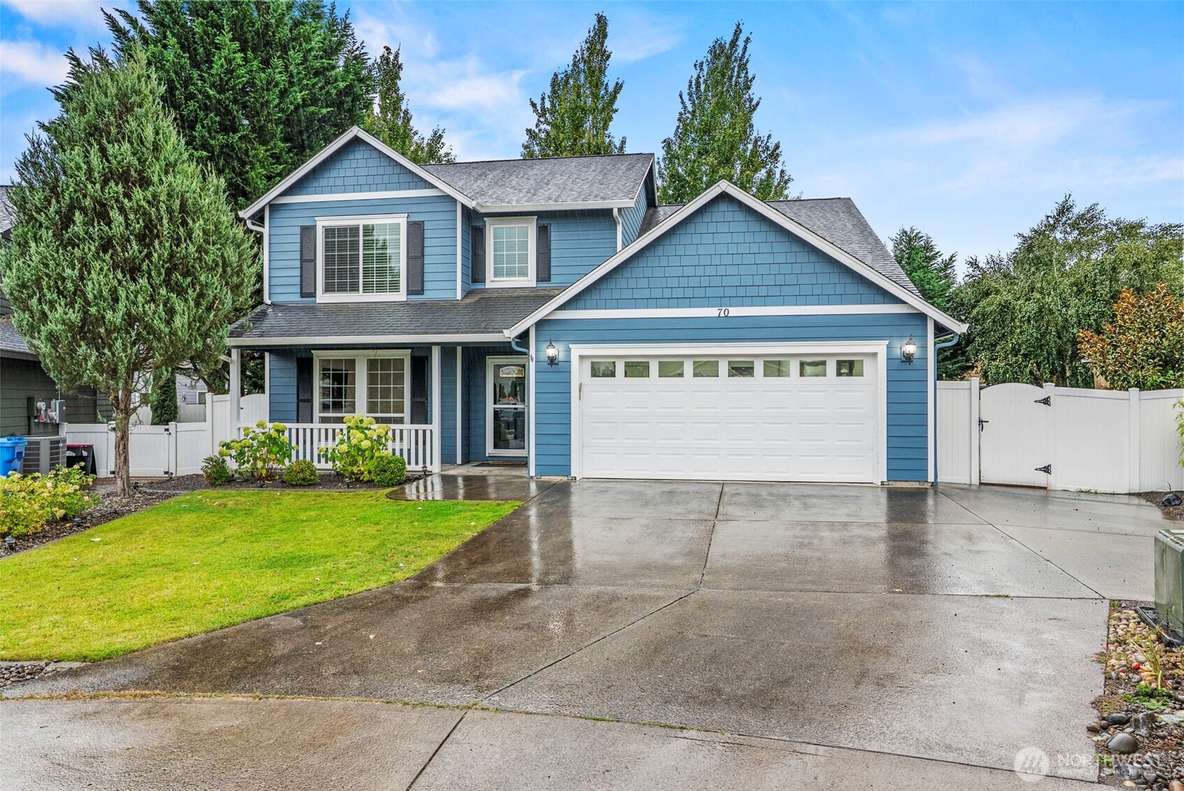 70 Crown Point Road Longview, WA 98632 - Photo 1 of 33 a view of a house with a yard and garage