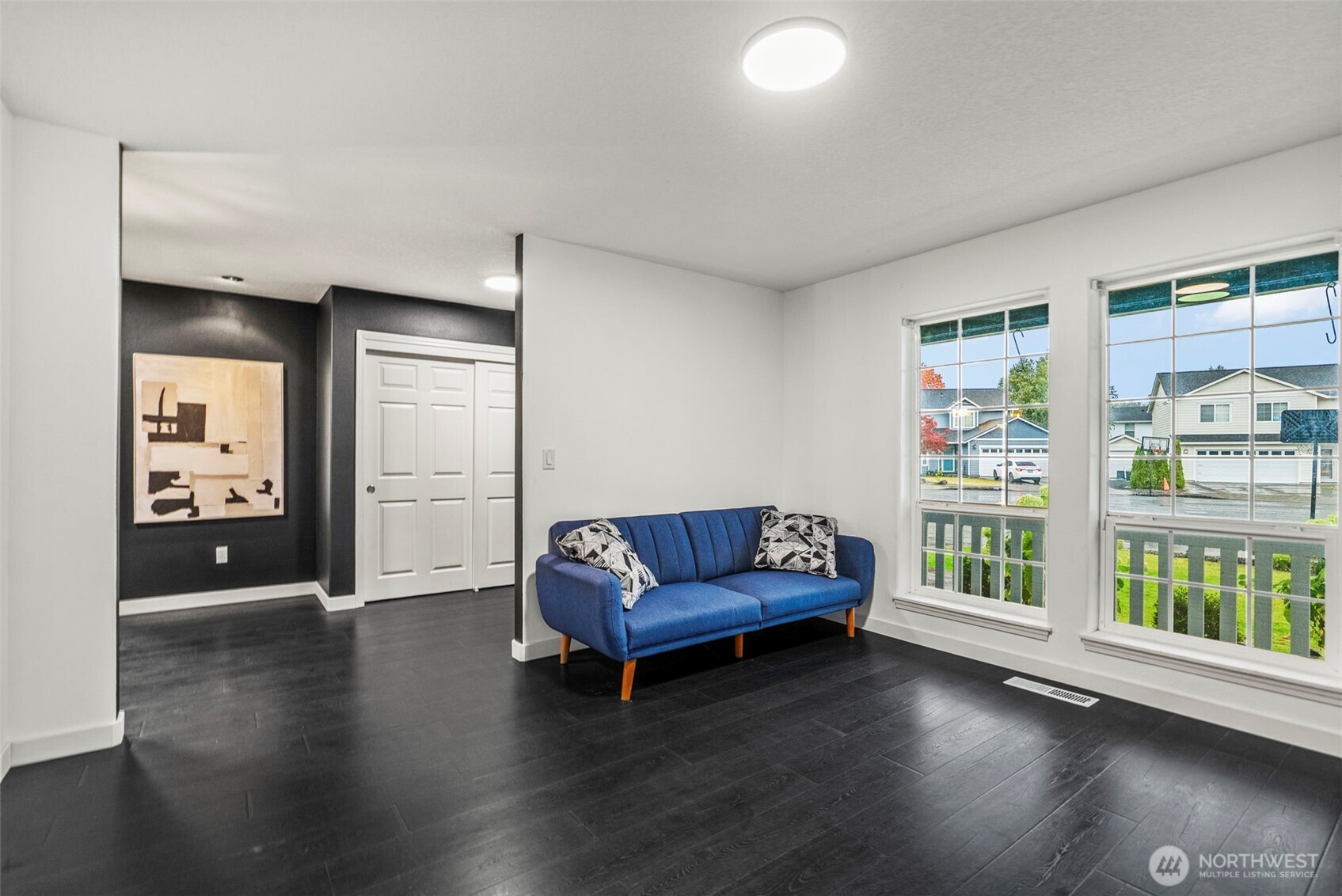 70 Crown Point Road Longview, WA 98632 - Photo 11 of 33 a living room with furniture and a large window