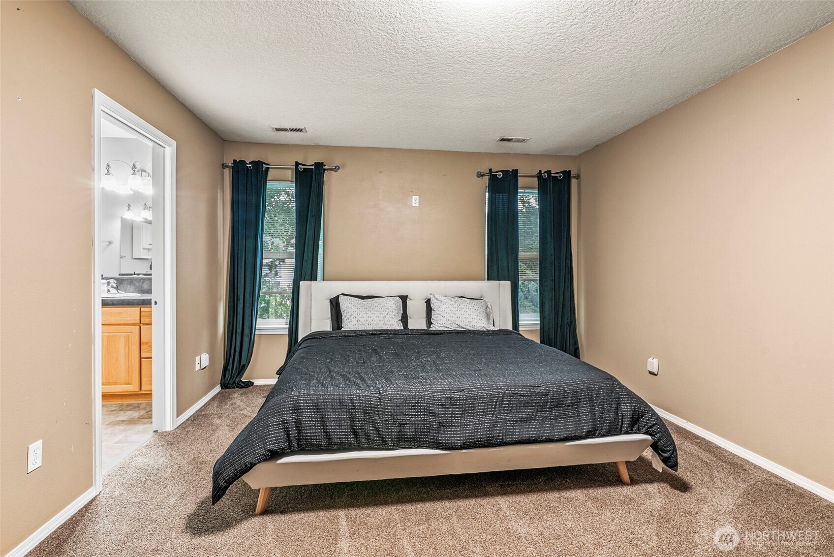 70 Crown Point Road Longview, WA 98632 - Photo 20 of 33 a bedroom with a bed and window