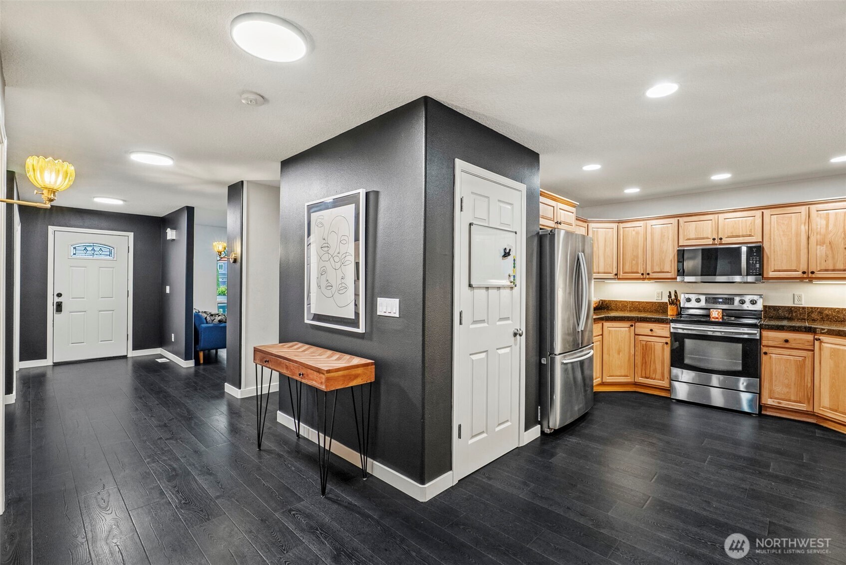 70 Crown Point Road Longview, WA 98632 - Photo 10 of 33 a kitchen with stainless steel appliances granite countertop a refrigerator and a stove top oven