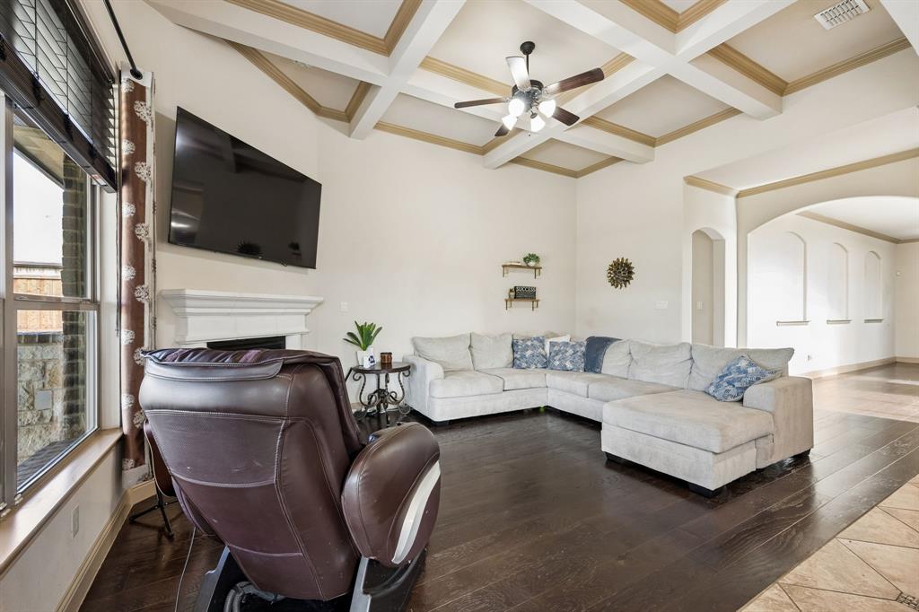 1341 Canary Lane Forney, TX 75126 - Photo 12 of 34 Living room with wood flooring and tray ceiling,