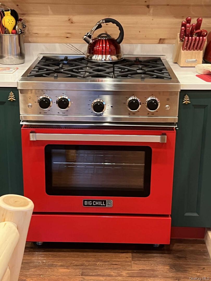 989 Chiloway Road Roscoe, NY 12776 - Photo 14 of 23 a stove top oven sitting inside of a kitchen