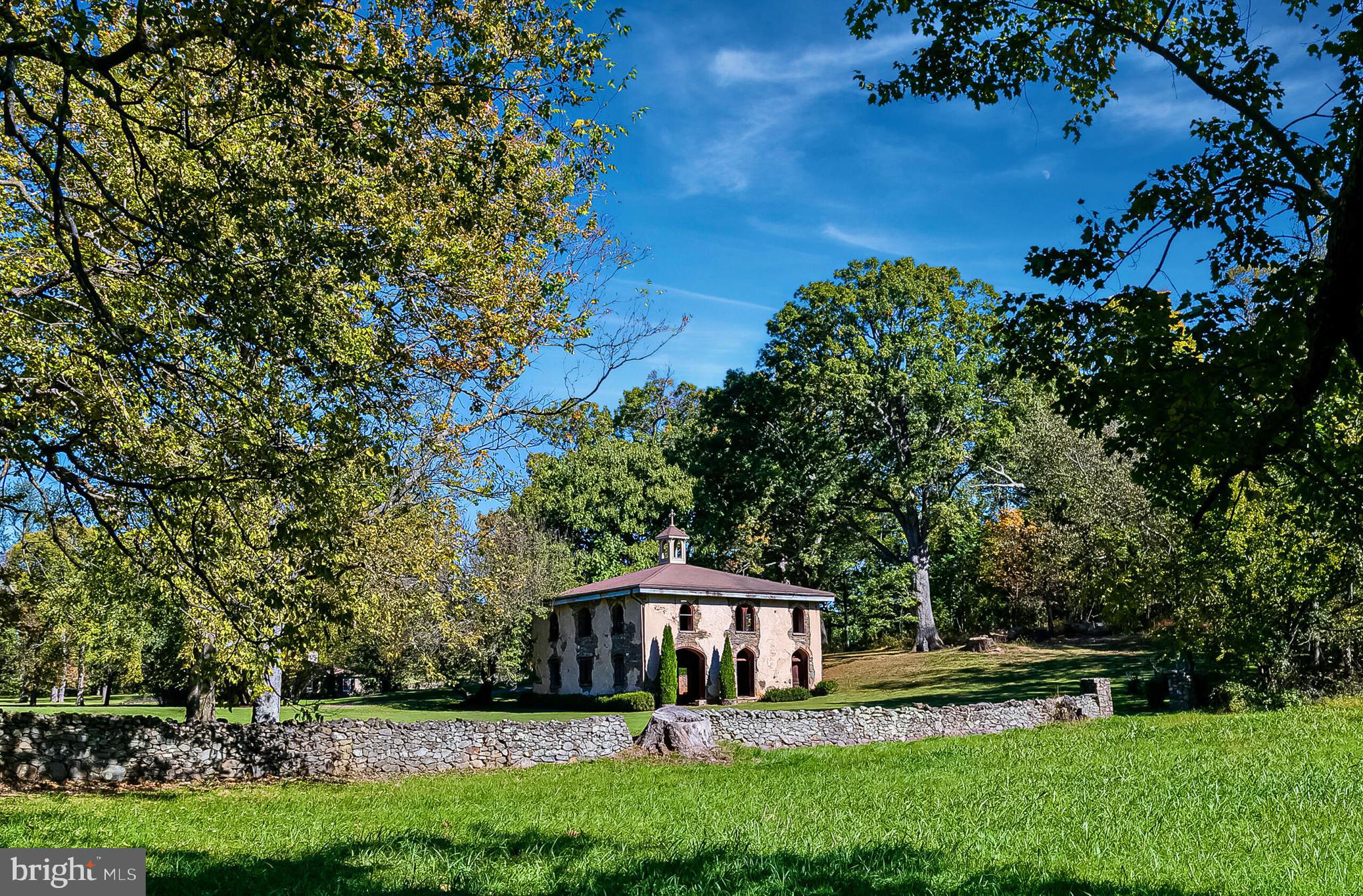 1610 Delaplane Grade Road Upperville, VA 20184 - Photo 18 of 123 a front view of a house with a yard