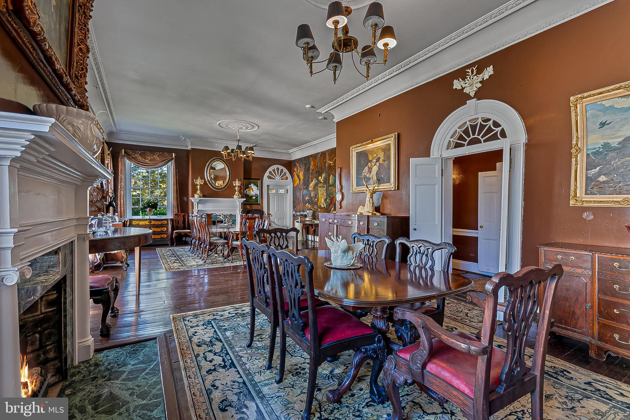 1610 Delaplane Grade Road Upperville, VA 20184 - Photo 83 of 123 a view of a dining room with furniture window and wooden floor