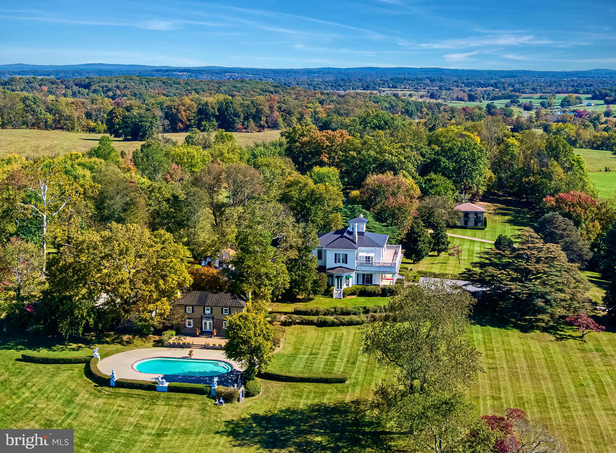 1610 Delaplane Grade Road Upperville, VA 20184 - Photo 9 of 123 an aerial view of a house with a garden and lake view