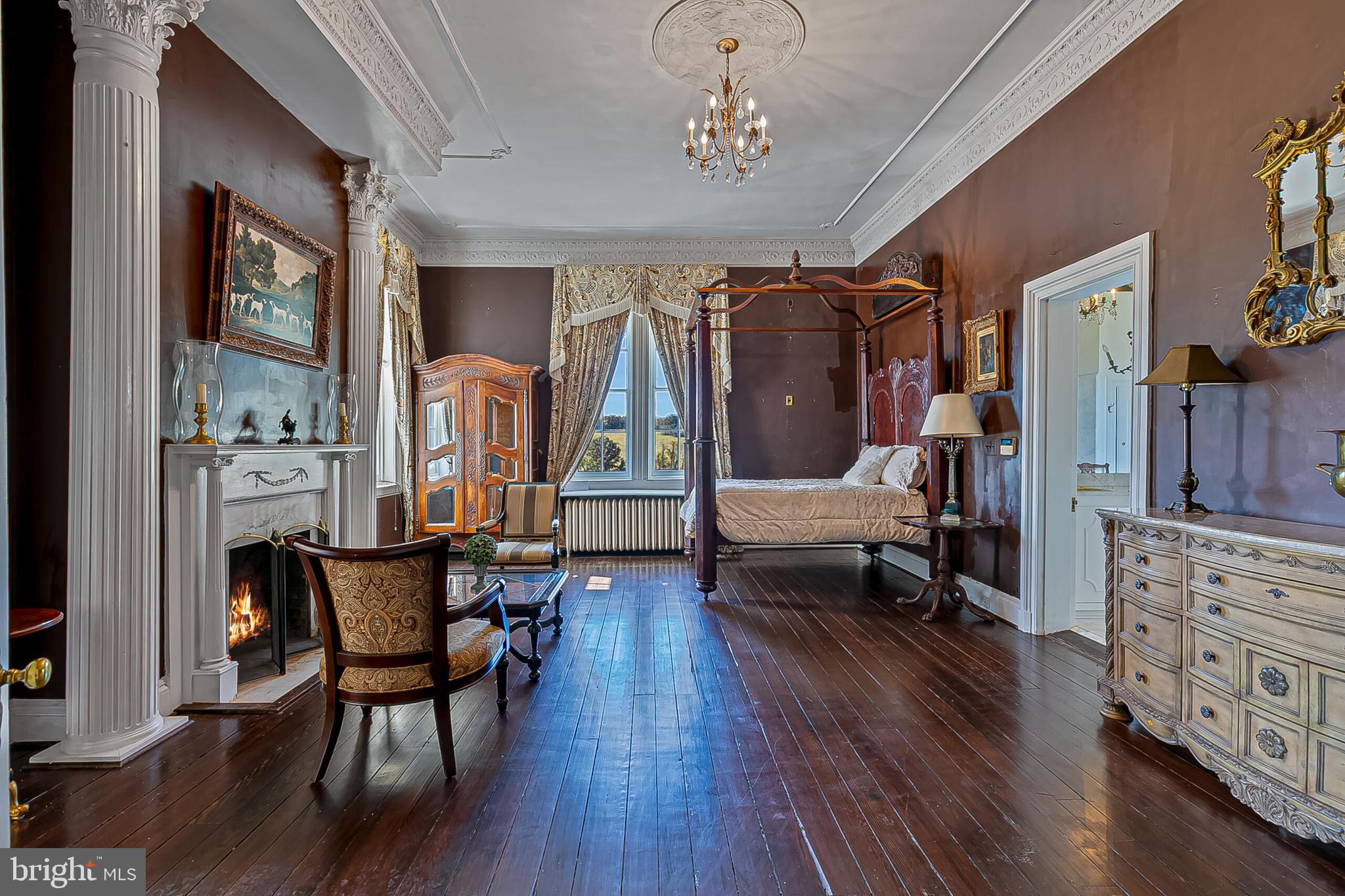 1610 Delaplane Grade Road Upperville, VA 20184 - Photo 91 of 123 a living room with furniture and a wooden floor