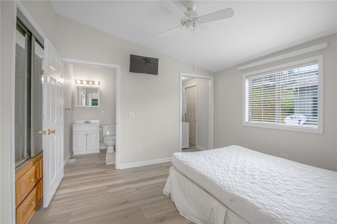 1230 Melton Road, Unit 25 West Union, SC 29696 - Photo 30 of 46 Well-lit sleeping quarters with a vaulted ceiling and direct access to a private bath and laundry.
