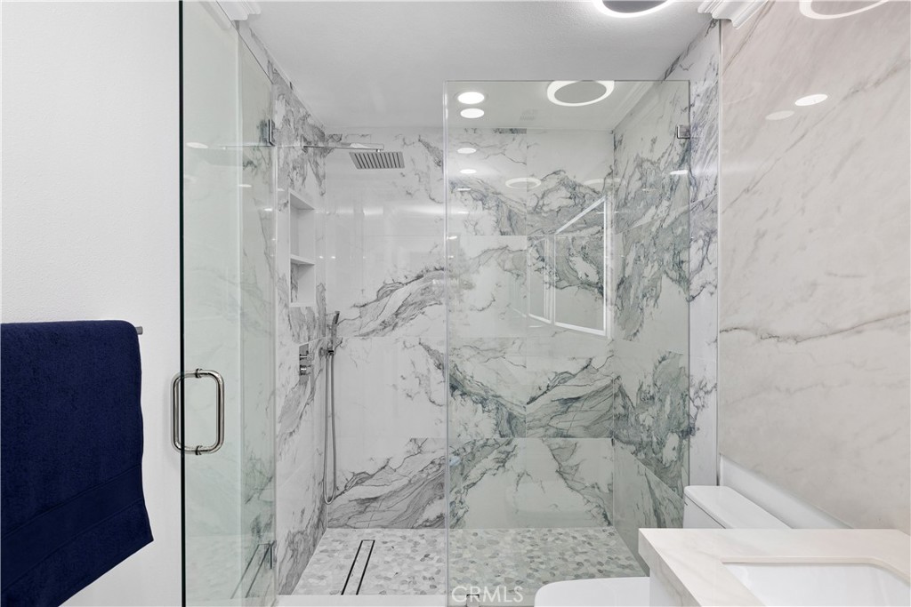3004 Cardamon Street Rialto, CA 92376 - Photo 33 of 60 Primary Bath Porcelain Slab Walk--in Shower