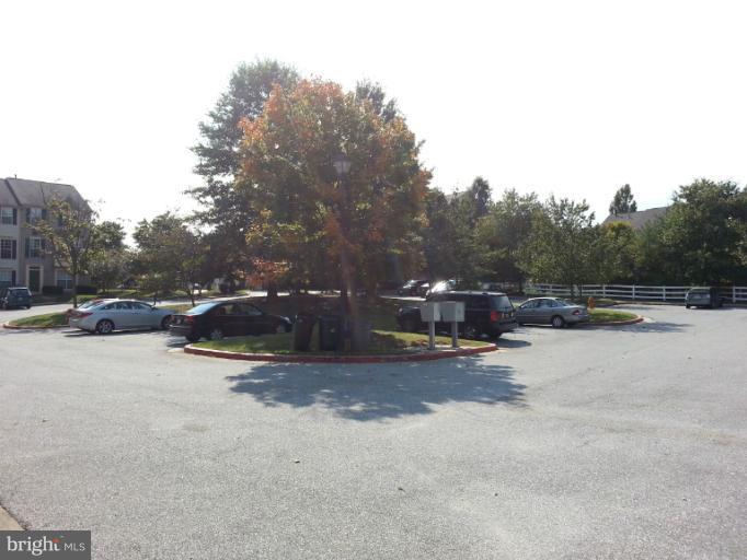 6174 Silver Arrows Way Columbia, MD 21045 - Photo 6 of 25 a view of outdoor space with swimming pool and sitting area