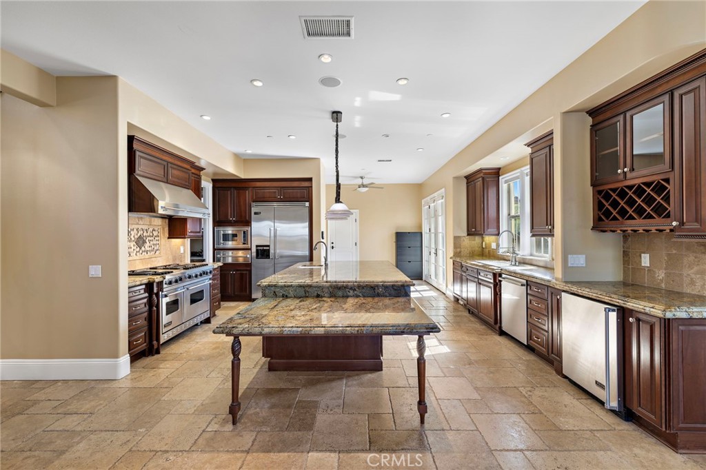 18 Via Cima San Clemente, CA 92672 - Photo 14 of 47 Beautiful, large kitchen with a Viking double oven gas range.