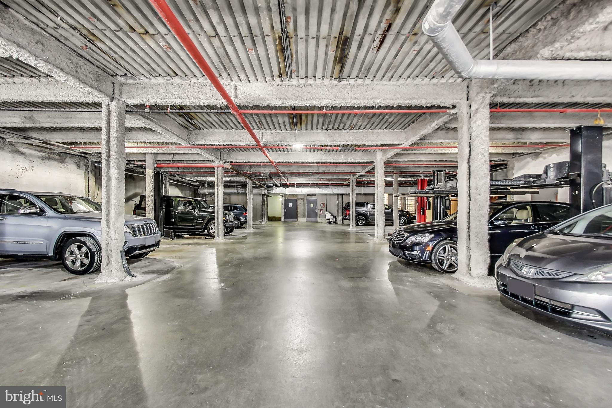 1700 Kalorama Road Northwest, Unit 311 Washington, DC 20009 - Photo 35 of 48 Covered Parking with an additional storage shed.