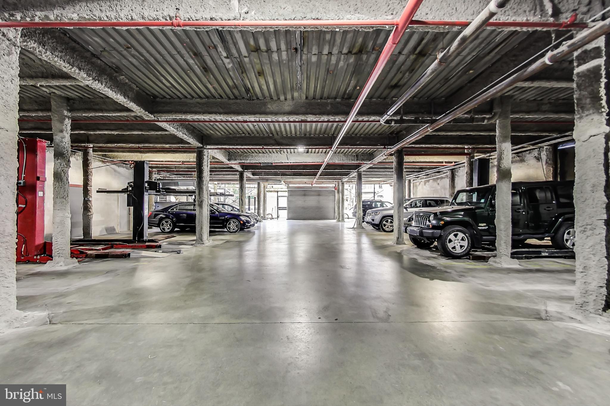 1700 Kalorama Road Northwest, Unit 311 Washington, DC 20009 - Photo 36 of 48 Covered Parking with an additional storage shed.