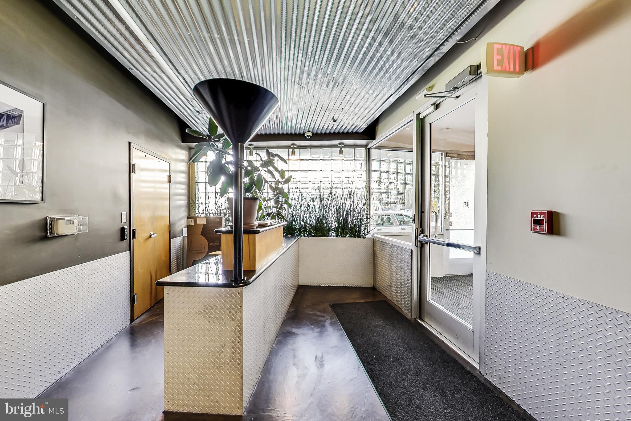 1700 Kalorama Road Northwest, Unit 311 Washington, DC 20009 - Photo 38 of 48 Entry way and secure, package room.