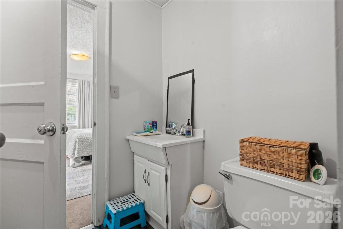 501 Church Street Cheraw, SC 29520 - Photo 43 of 48 a bathroom with a sink toilet and shower