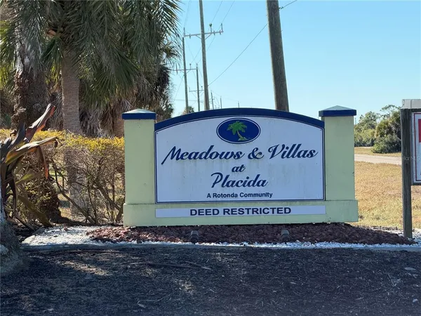 a sign on the side of the road