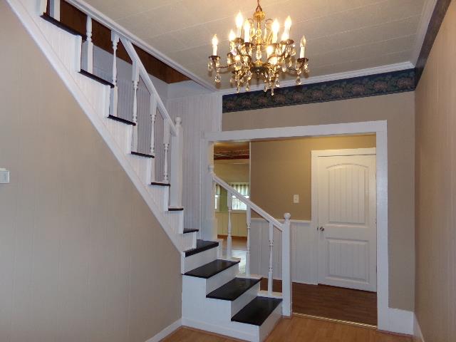 201 Spring Street Decherd, TN 37324 - Photo 11 of 26 Entry foyer-stair to upper level-two bedrooms